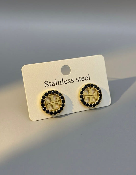 Gold Emblem Stud Earrings Black Stone Halo